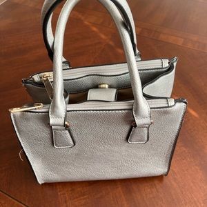Silver hand bag.  Slightly used in good condition.